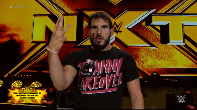 Gargano holds up the number 3 with his fingers, calling for a rubber match with him and Cole, on July 17 nXt.
