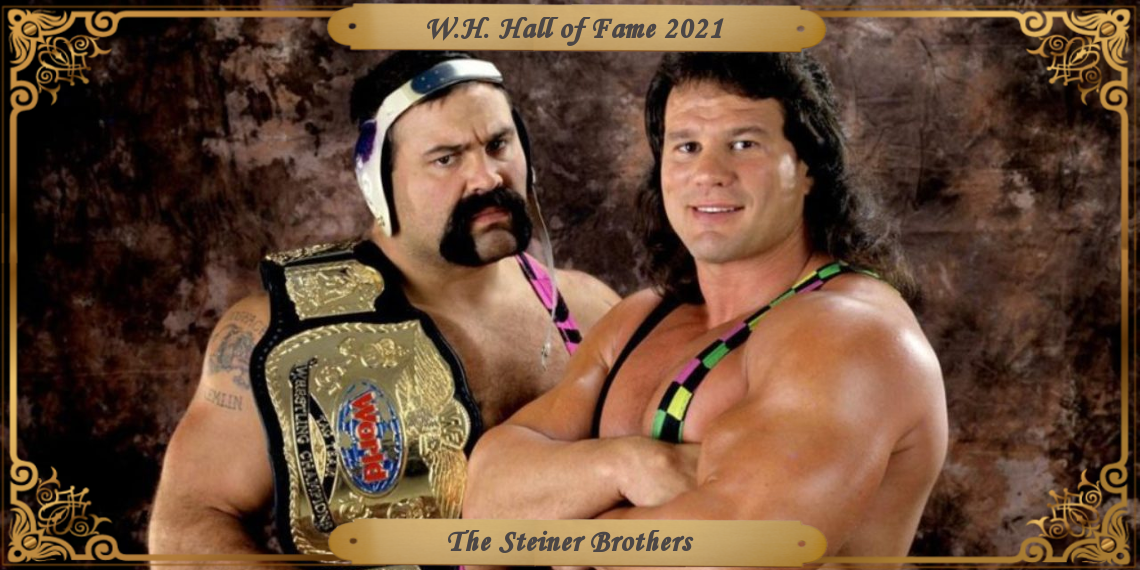 Wearing their 1993-era WWE neon and black singlets, Rick, on left in his traditional wrestling headpiece and Scott with his long hair pose for the camera.