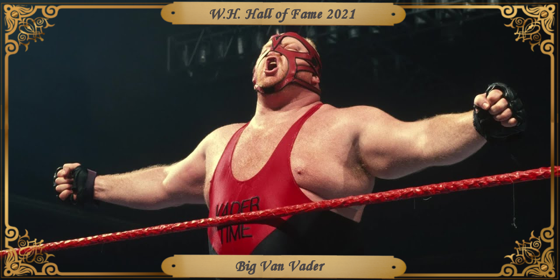 Vader, with arms outstretched, posing in the ring during his mid-90's WWF run.