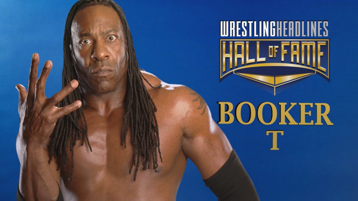 Booker T glares at the camera with a serious face, holding up his right hand with fingers and thumb outstretched to show "5-time champion". He is shirtless and wearing his hair in dreadlocks that drape over his pec muscles.