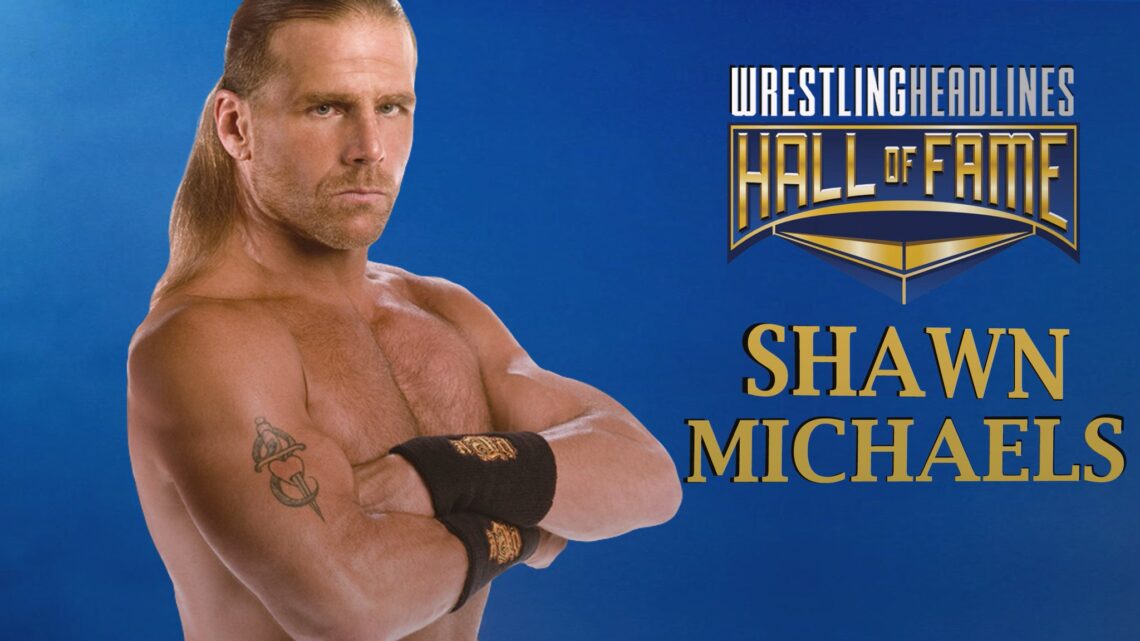 Shawn Michaels has his arms crossed, wearing no shirt, hair tied back in a ponytail behind his head. He is wearing black and gold wristbands that stretch up his arms.