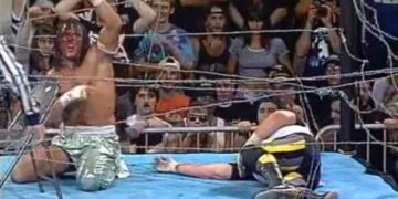 Sabu celebrates mid-match during his no ropes barbed wire match against Terry Funk for the ECW title in 1997.
