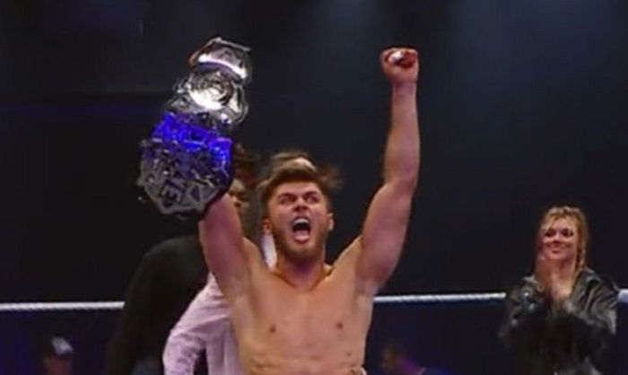 Jackson Drake Crowned First-Ever WWE EVOLVE World Champion, Presented Title By Je’Von Evans