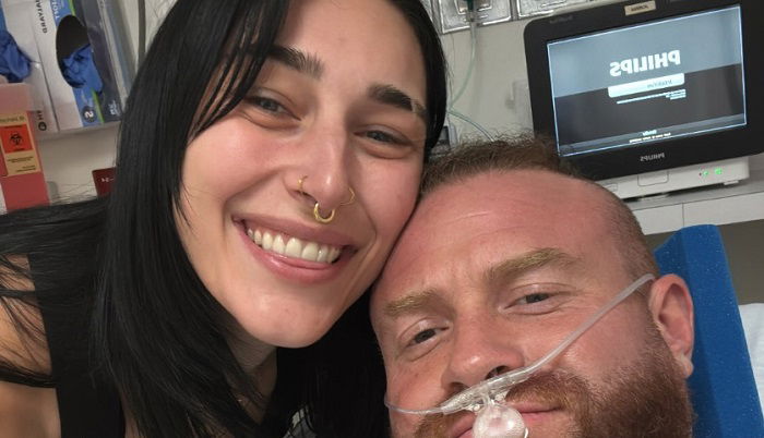 Buddy Matthews Shares Photo Of Himself In Hospital With Rhea Ripley By His Side Moments Before Undergoing Surgery