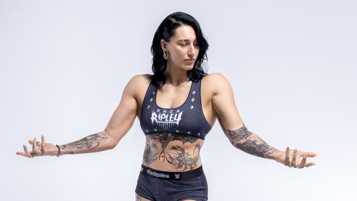 Rhea Ripley Reveals Massive New Chest Tattoo (WATCH), Jim Ross Blasts Mick Foley’s Teeth Issues