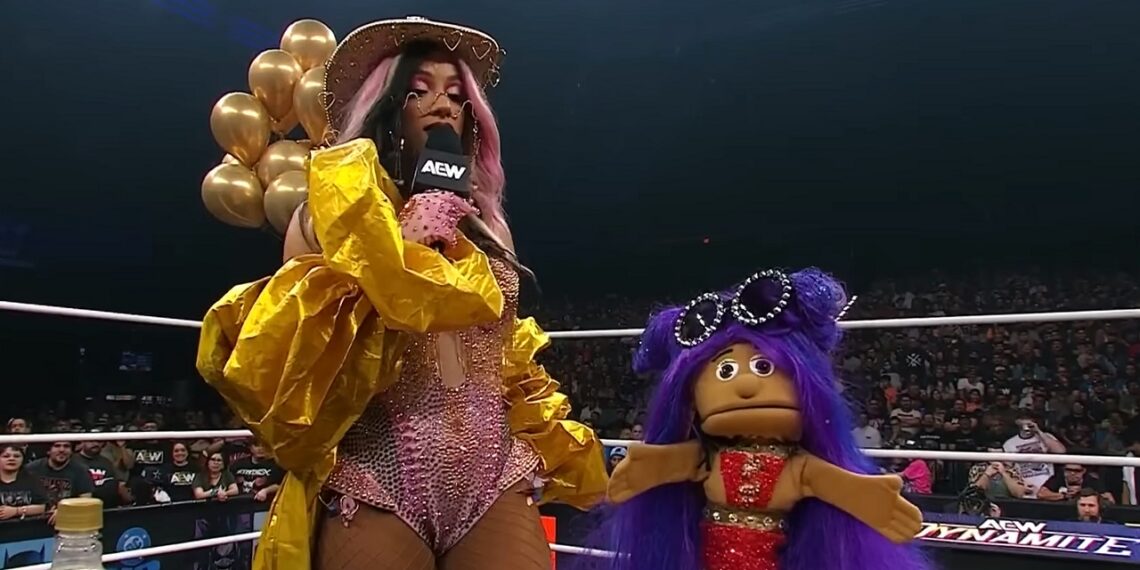 Mercedes Mone with 'Mini-Mone' puppet from AEW Dynamite on October 22, 2025  |  Source: AEW