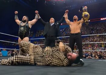 Bron Breakker poses with the world heavyweight championship alongside Paul Heyman and Bronson Reed. Breakker and Reed turned on Seth Rollins during the Oct. 13, 2025 Raw. | Source: WWE YouTube