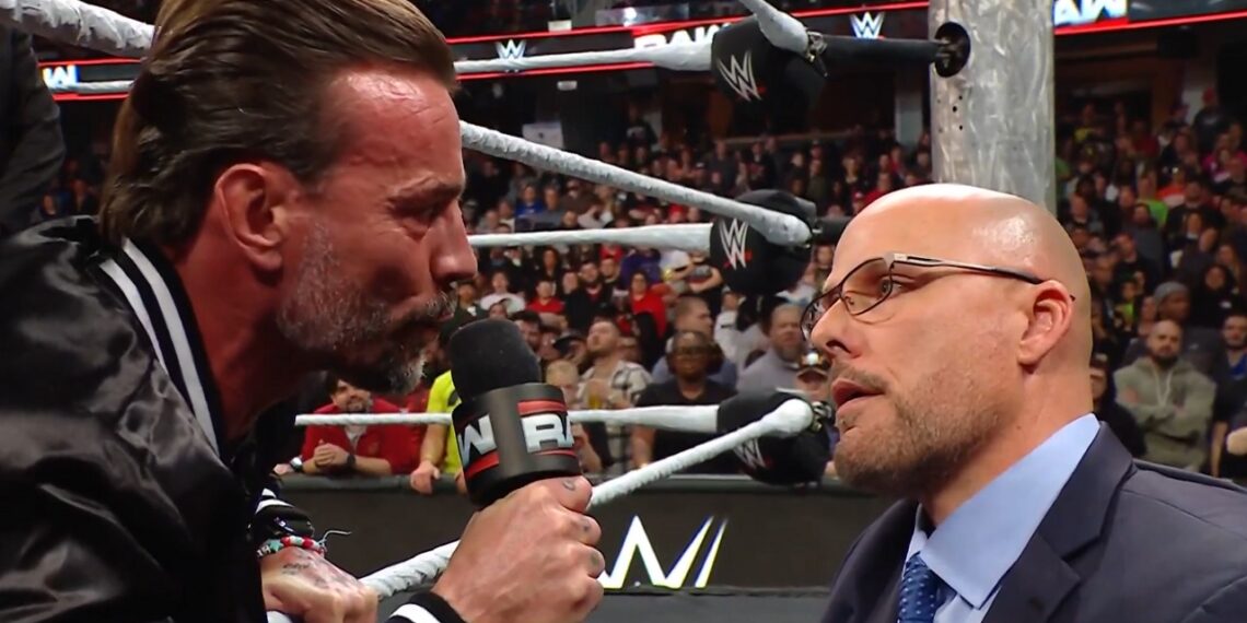 CM Punk and WWE Raw General Manager Adam Pearce | Source: WWE