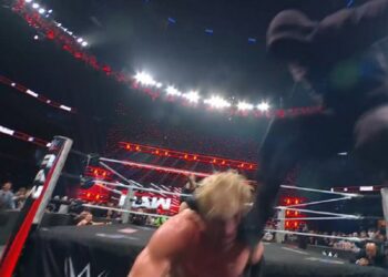 Mystery masked man attacks Logan Paul | Source: WWE