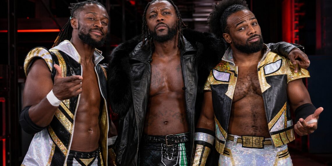 The New Day's Kofi Kingston and Xavier Woods (Austin Creed) with AEW's Swerve Strickland