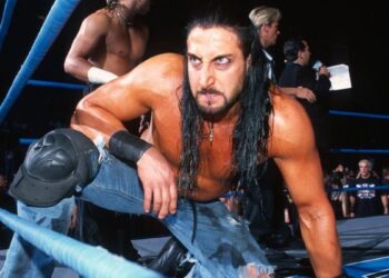 Crowbar crouches in a WCW wrestling ring