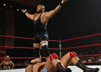D'Lo Brown standing in a WWE ring